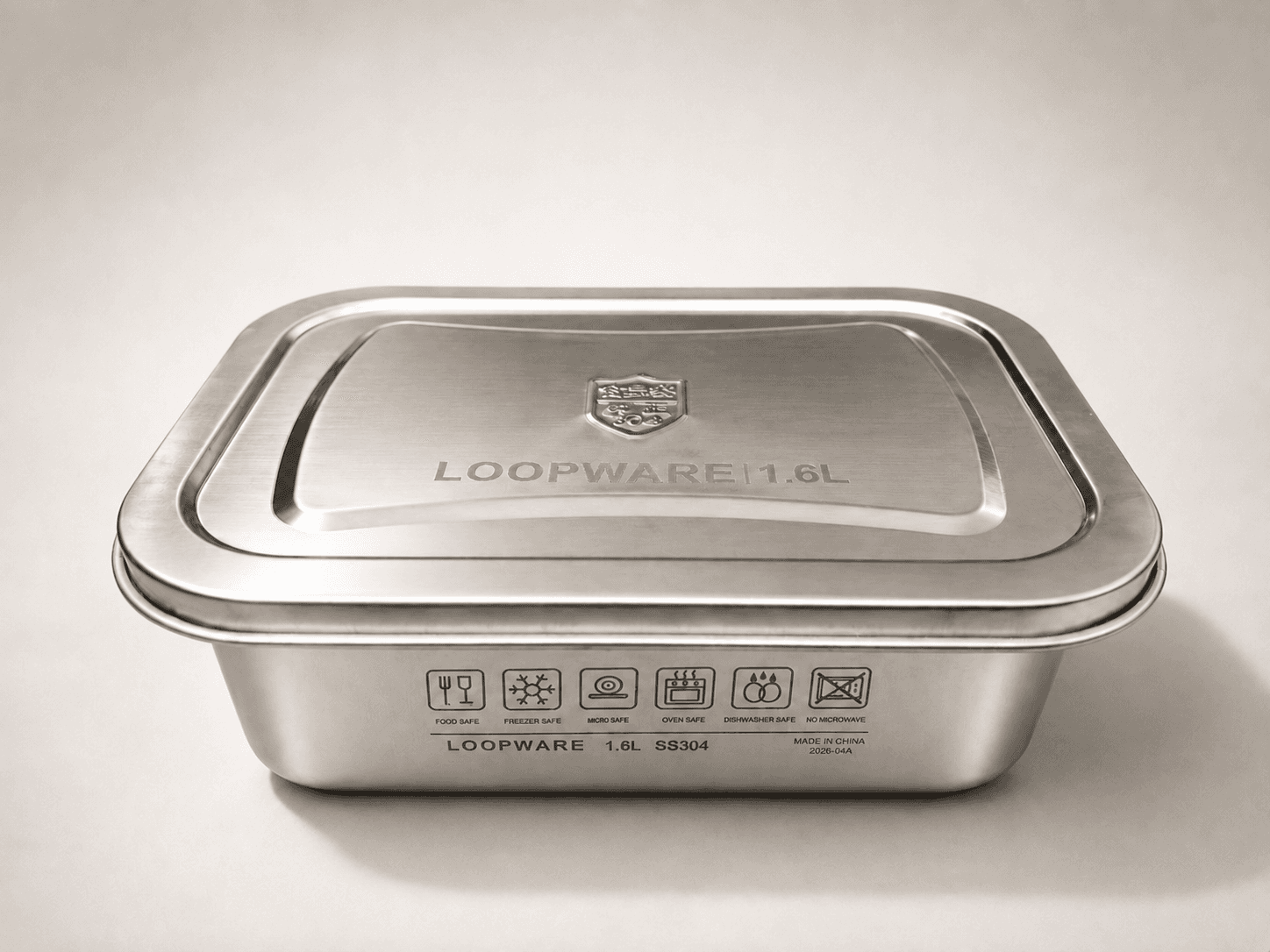 A Loopware 1.6L stainless steel container with its steel lid pressed on, ready for the fridge